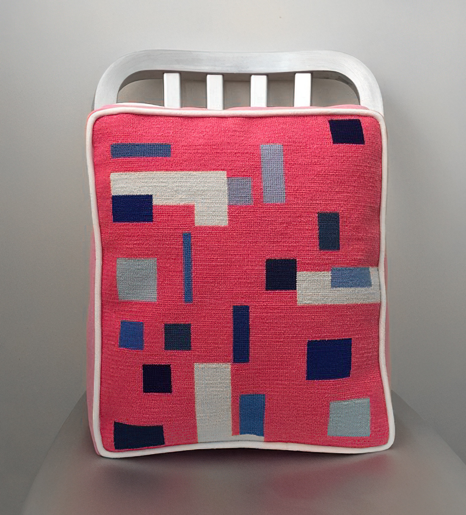 colorful rectangle pillow on chair