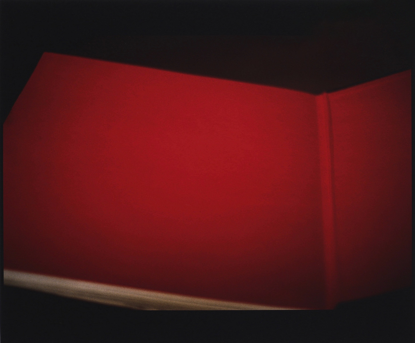 open book with solid red pages