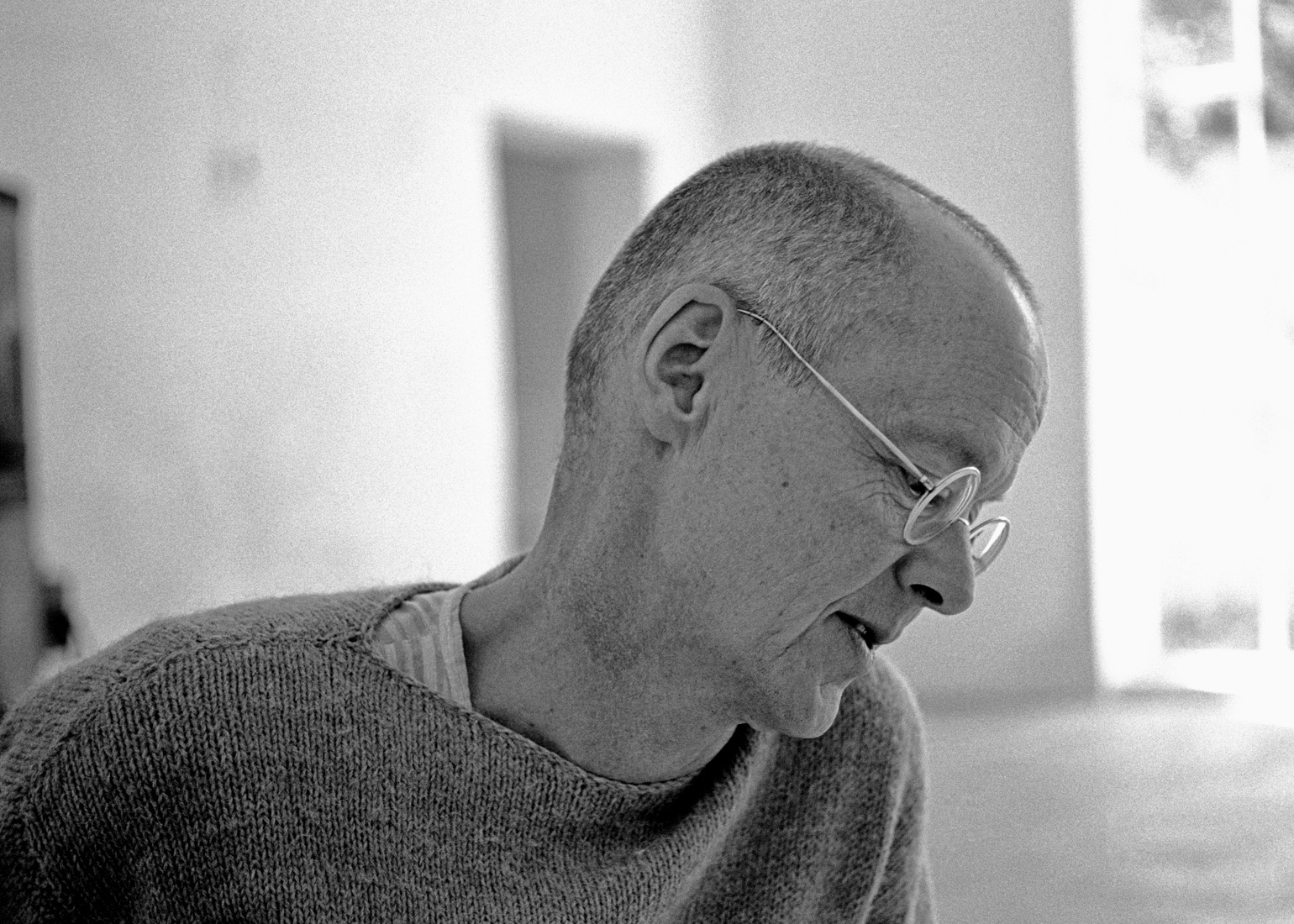 side view of artist in his studio